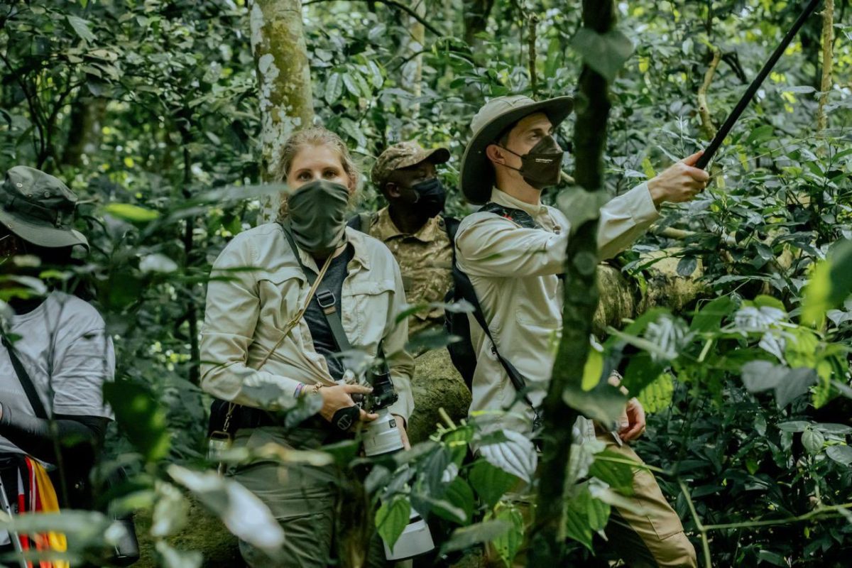 Tourists preparing for gorilla trekking during Rwanda's peak travel season